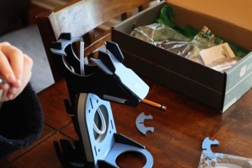 Here our kid reviewer is nearly half way through the project - working hard with small pieces. He says it's great to get nice plastic parts to work with - though metal would be ok as well.