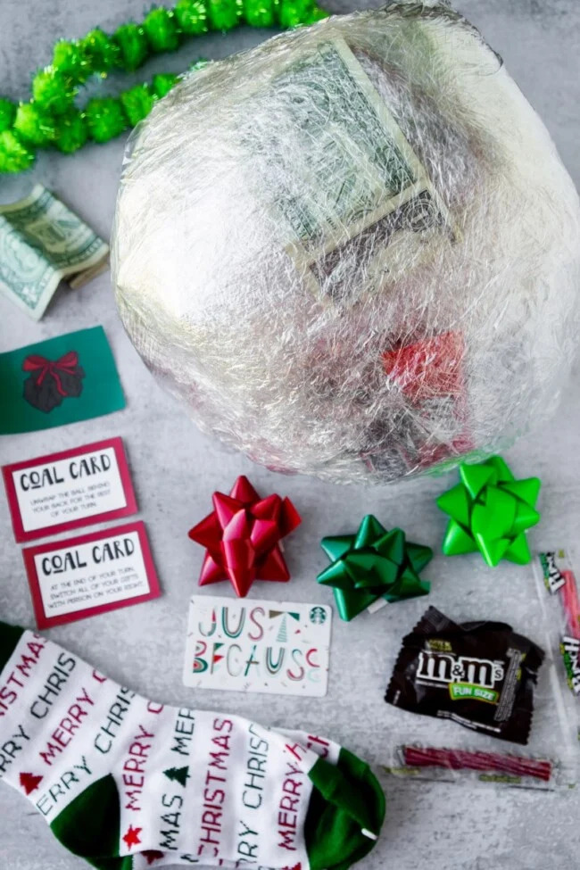 Lump of Coal Christmas Saran Wrap Gift to unwrap and roll the dice